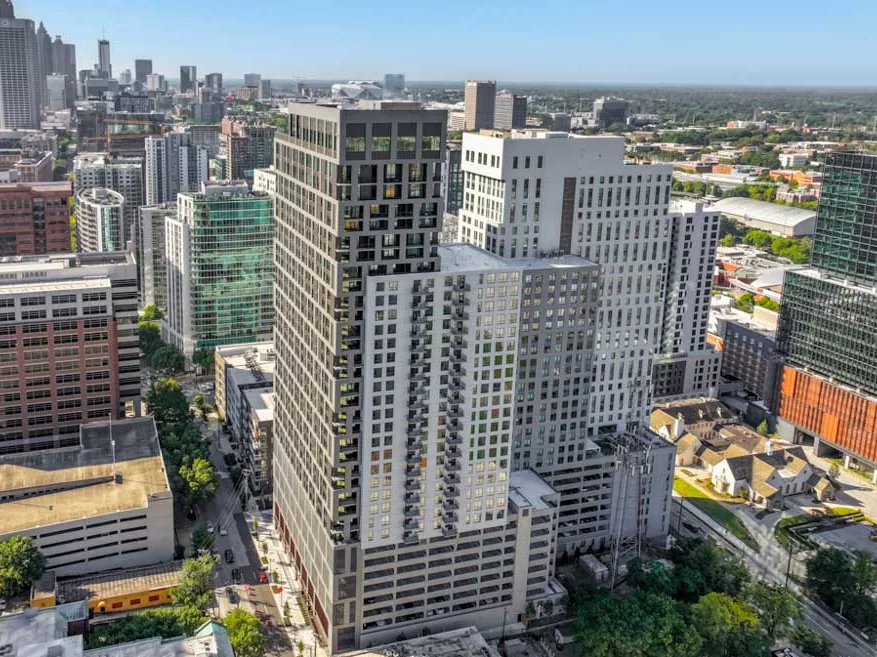 High-rise buildings in Midtown with urban skyline views and nearby structures.